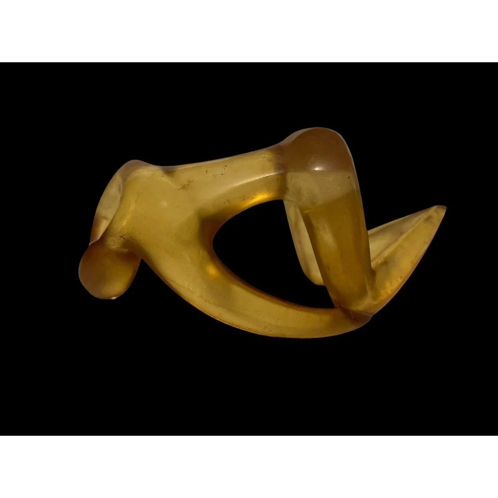 Faceless Lying Down Minimalistic Modern Art StatueYellow Lucite Resin